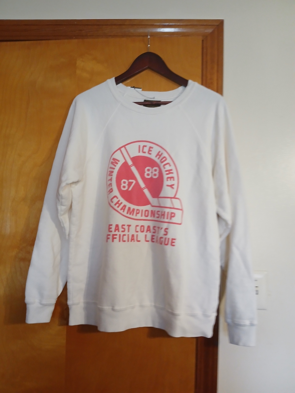 White Crewneck Sweatshirt with Red Ice Hockey Graphic